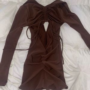 The brand isFashionova, color brown, size XS
